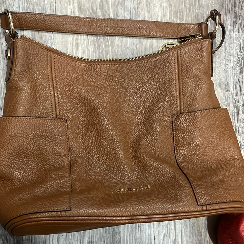 Michael kors guc brown clean inside no cracks or stains as is